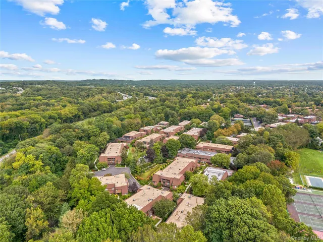 a view of city and green space