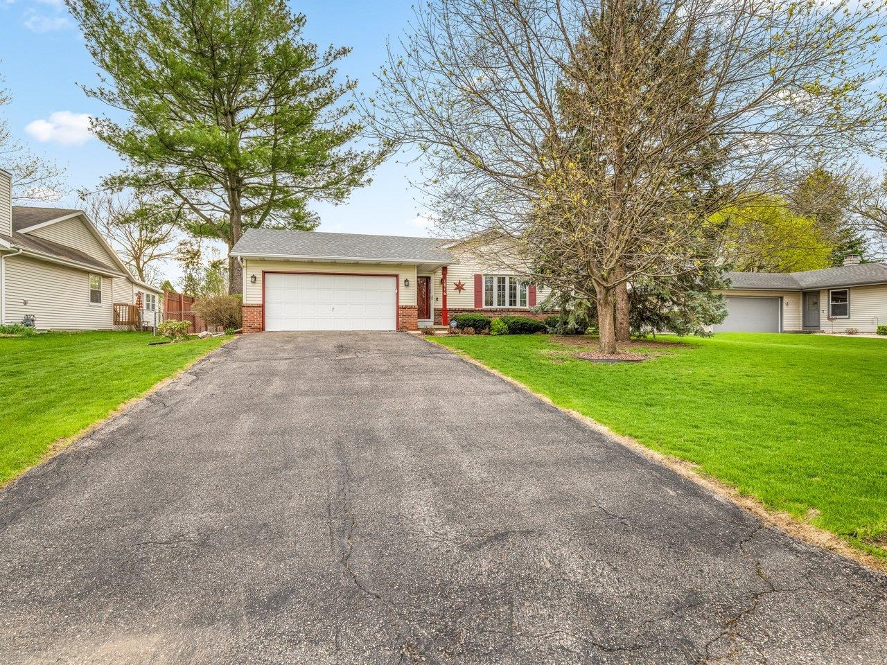 1816 Post Road Beloit, WI 53511 - Photo 2 of 42 a front view of house with yard and green space