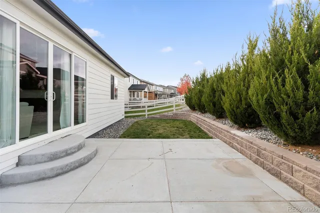 a view of a back yard of the house
