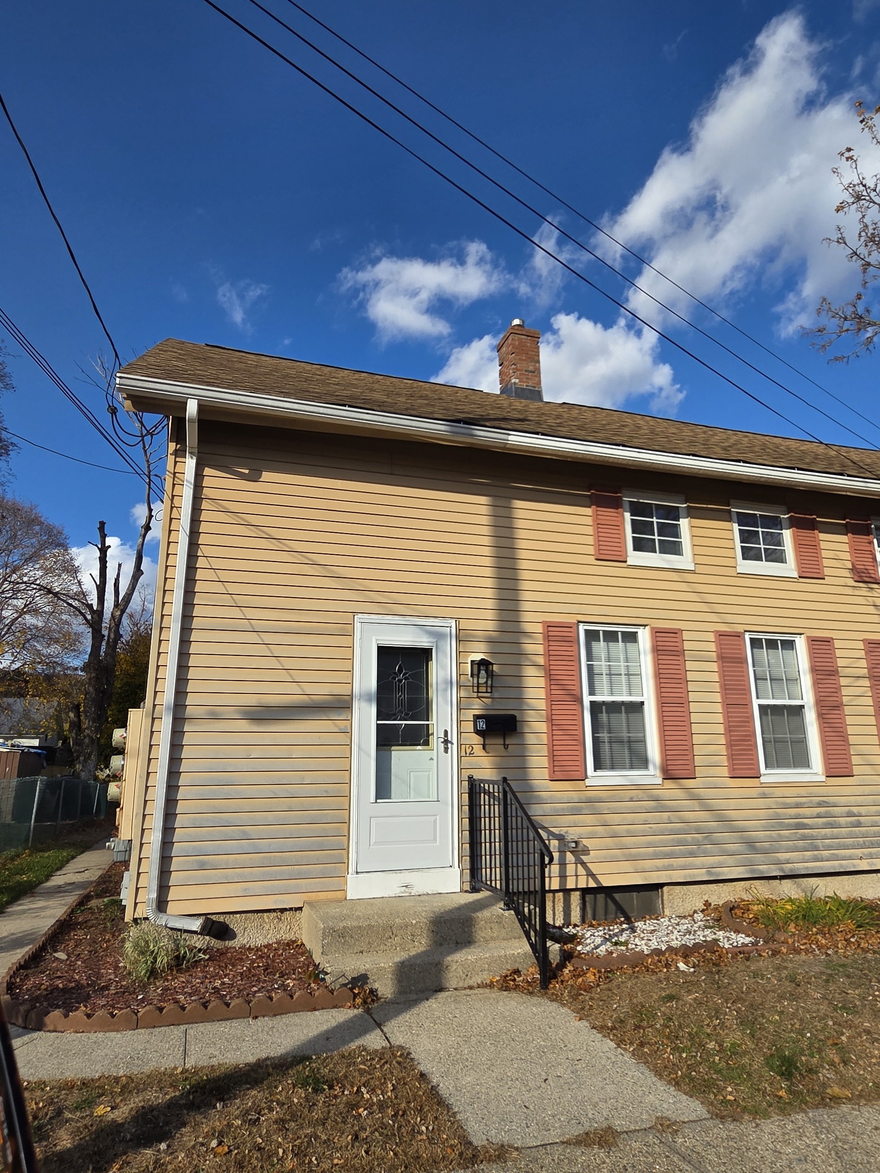 a front view of a house with a garage
