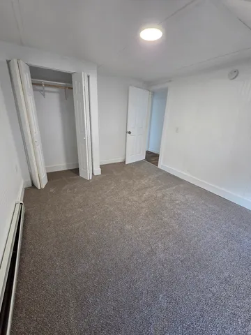 an empty room with closet