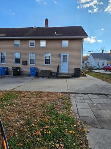 a view of a house with a patio