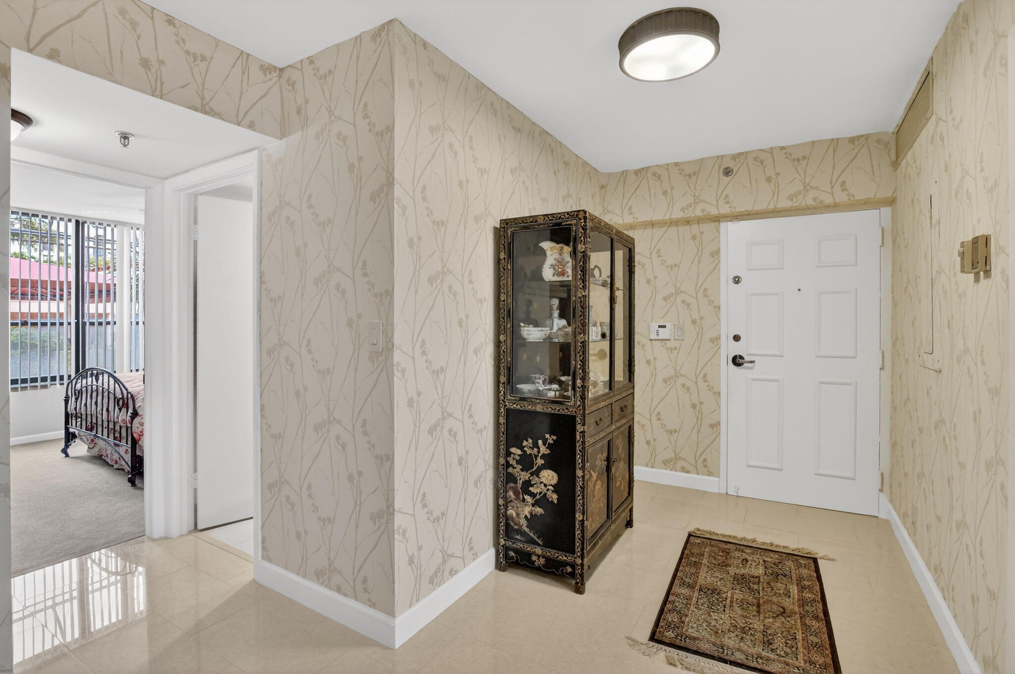 7201 Promenade Drive, Unit 102 Boca Raton, FL 33433 - Photo 2 of 55 foyer