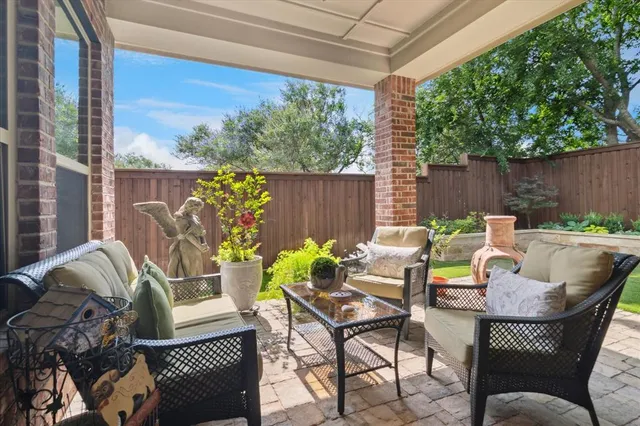 a view of a park with large trees