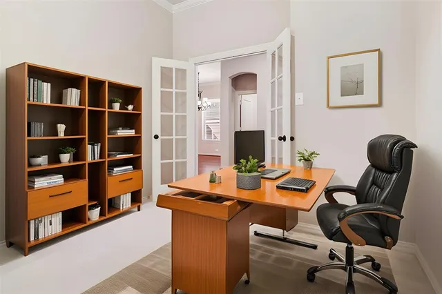 a view of a workspace with furniture and toys