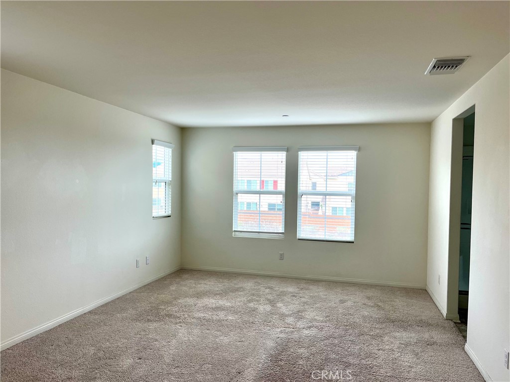 1586 Redwoods Drive Place Upland, CA 91784 - Photo 11 of 18 an empty room with a window