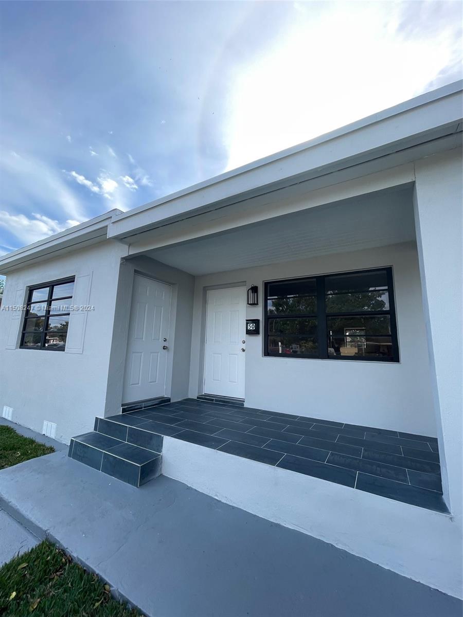 50 East 13th Street Hialeah, FL 33010 - Photo 3 of 17 a view of a garage