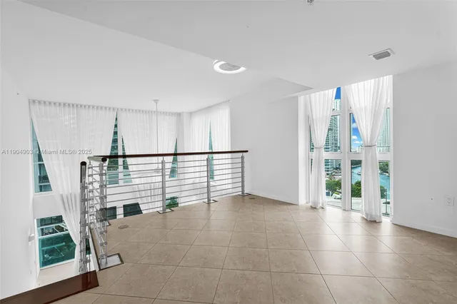 a view of a swimming pool with outdoor seating