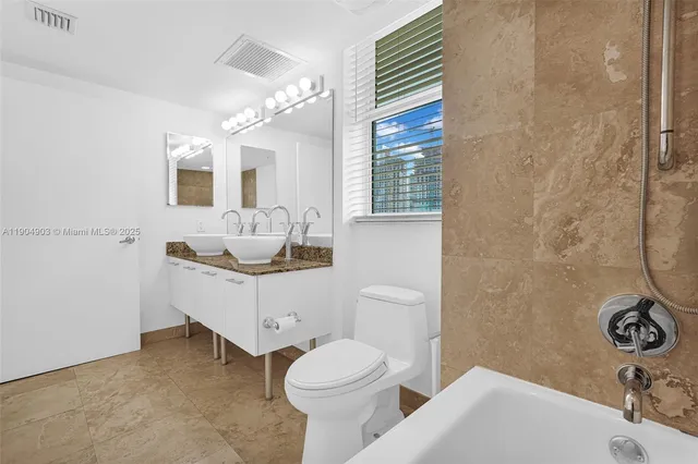 a view of a city with tall buildings