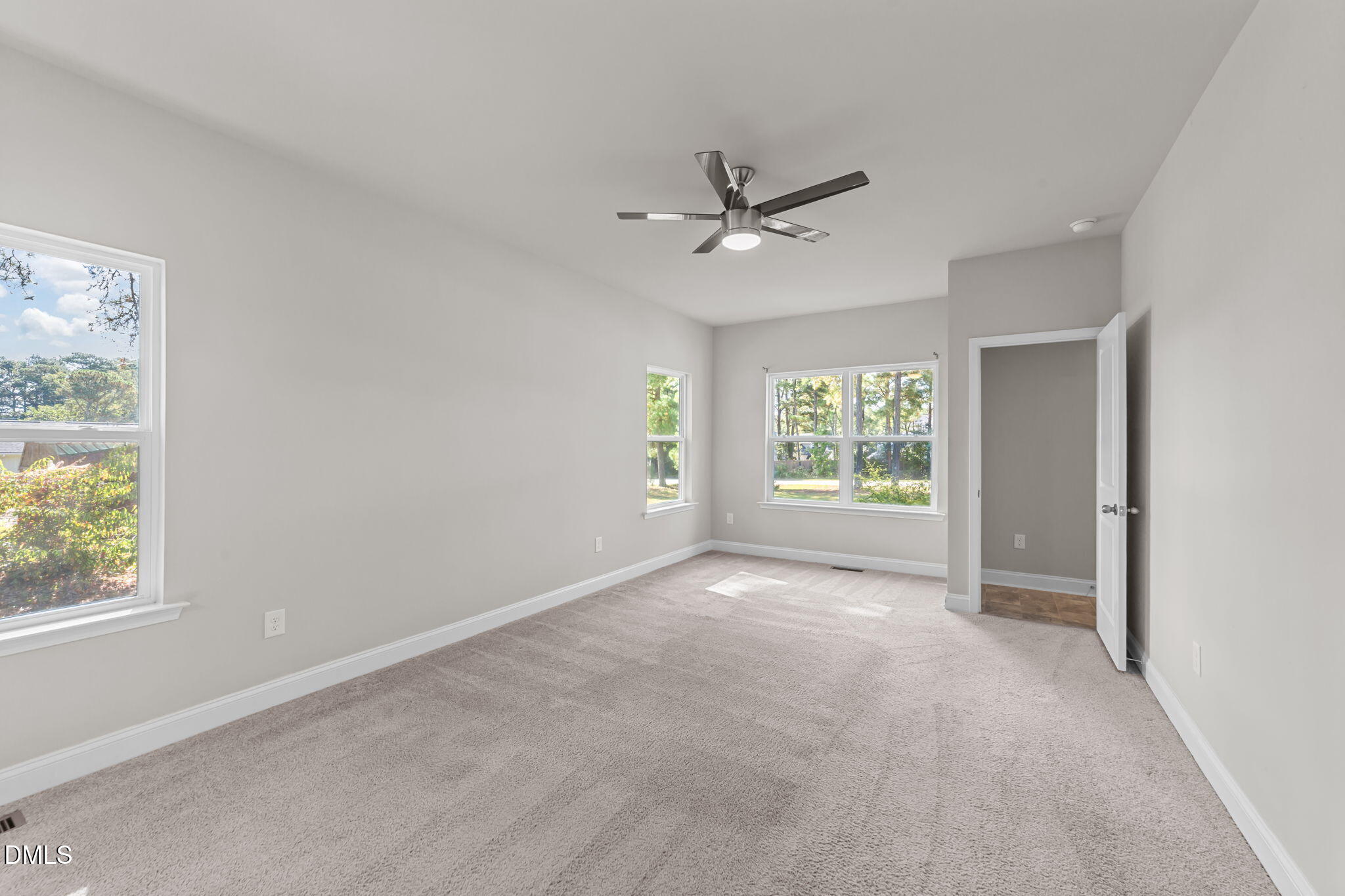 2504 Fleming Road Fuquay-Varina, NC 27526 - Photo 24 of 41 a view of room with a ceiling fan and window