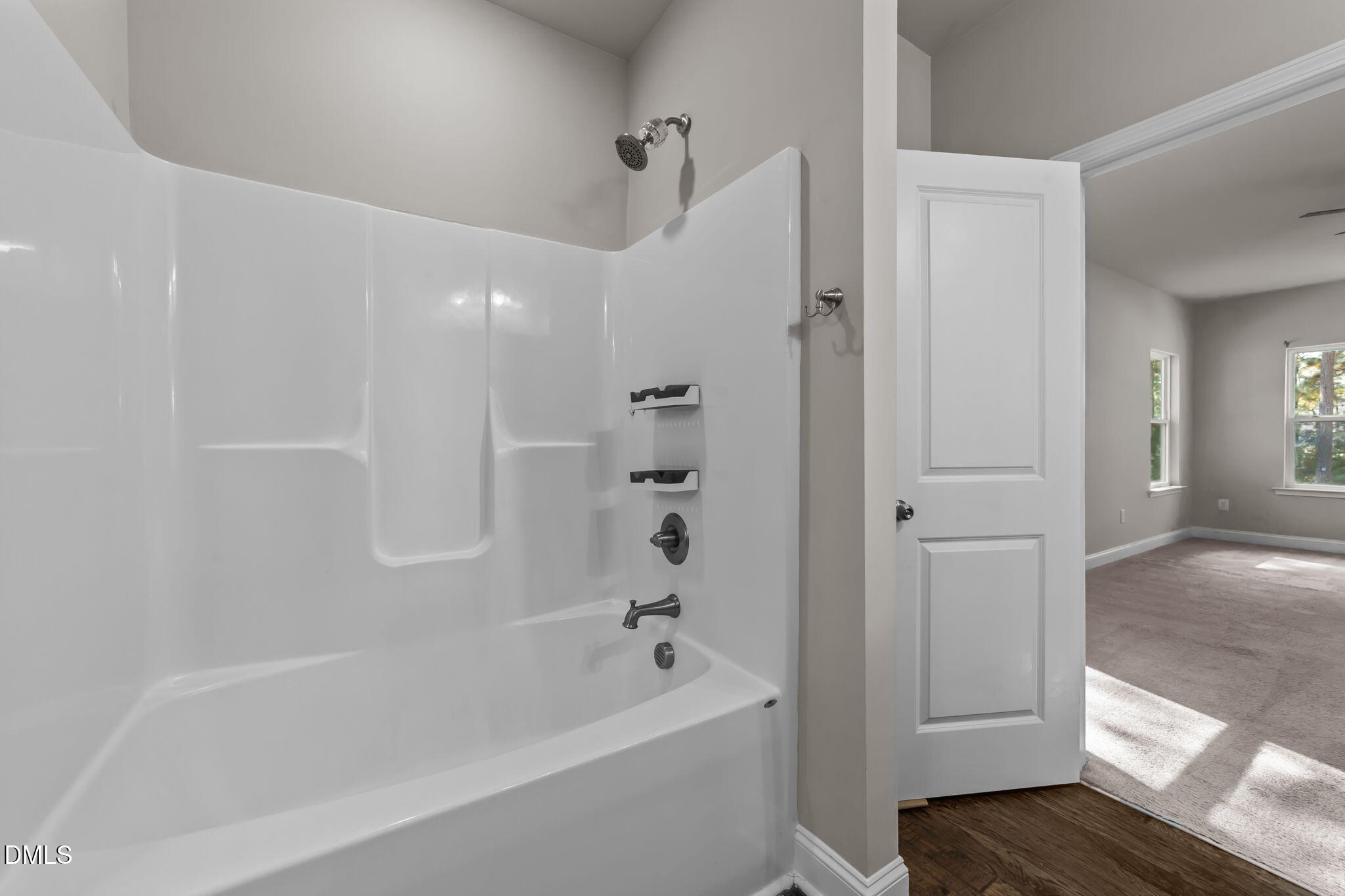 2504 Fleming Road Fuquay-Varina, NC 27526 - Photo 27 of 41 a bathroom with a bathtub and shower