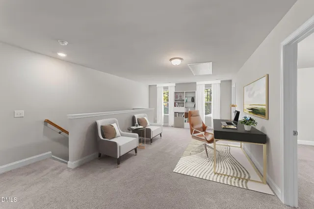 a living room with furniture a window and a table