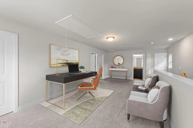 a living room with furniture a flat screen tv and a lamp