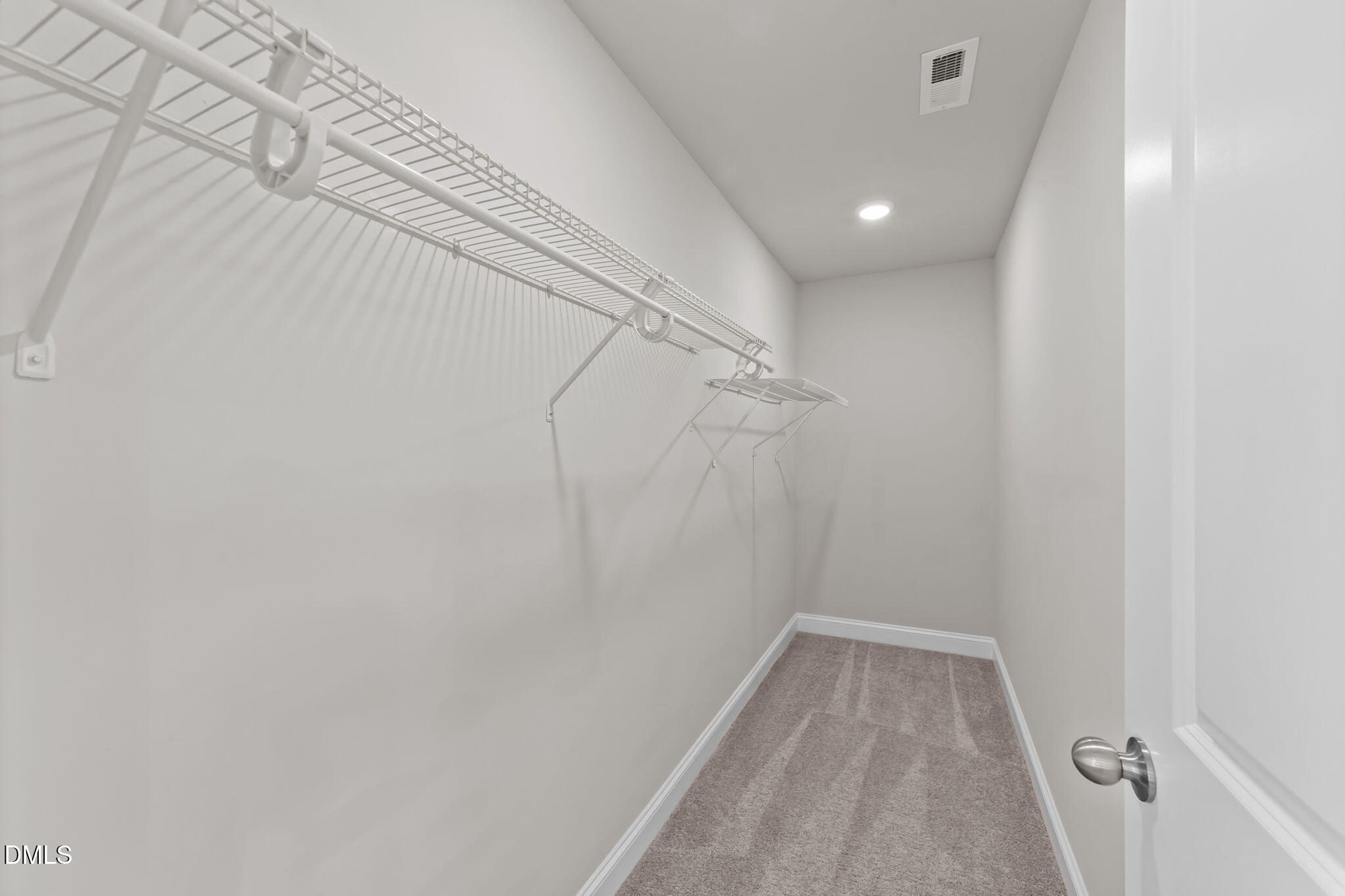 2504 Fleming Road Fuquay-Varina, NC 27526 - Photo 33 of 41 a view of a room with racks on the wall