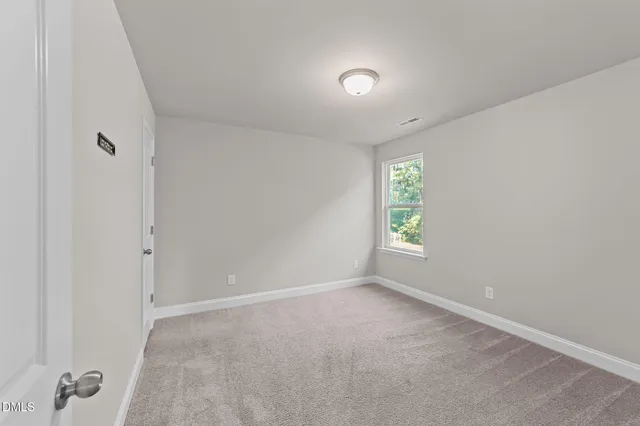 a house view with a backyard space