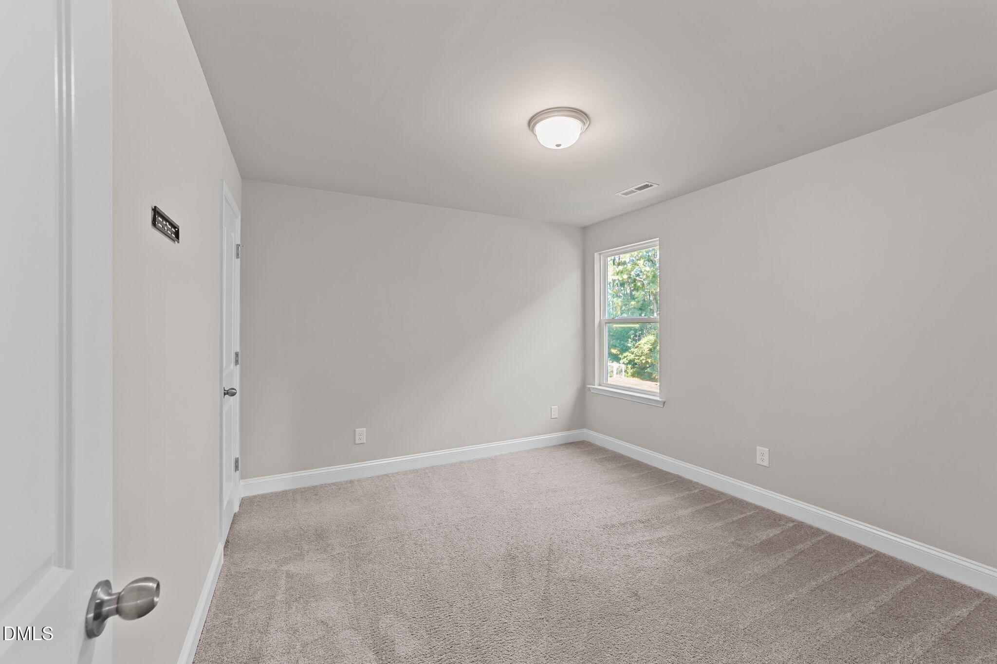 2504 Fleming Road Fuquay-Varina, NC 27526 - Photo 38 of 41 a view of an empty room with a window