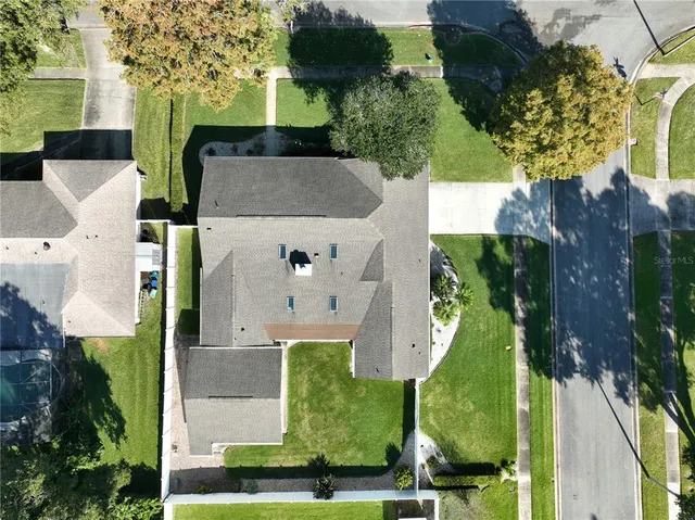 a view of a lake with a yard