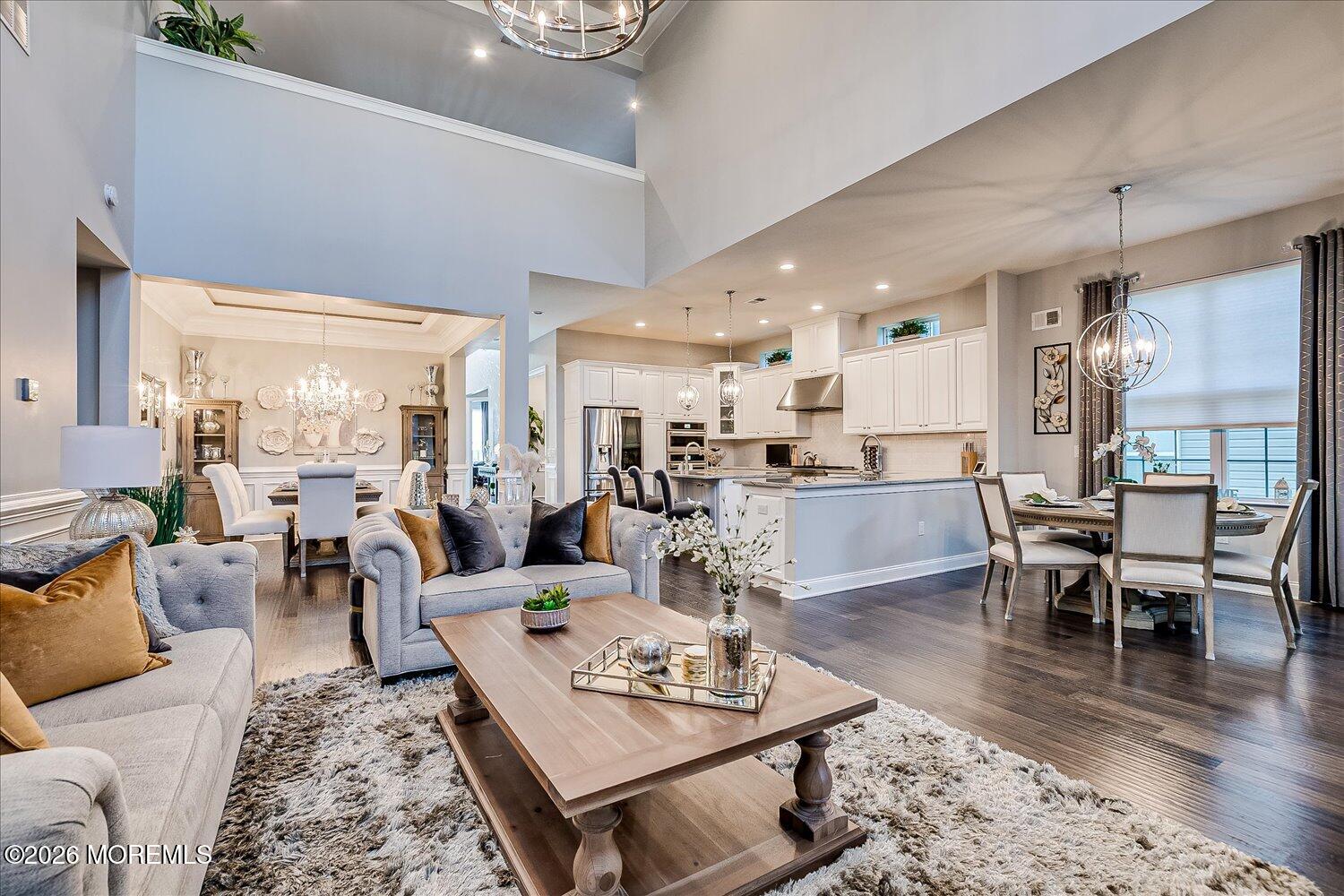 9 Militia Hill Road Freehold, NJ 07728 - Photo 13 of 67 a living room with lots of furniture and view of kitchen