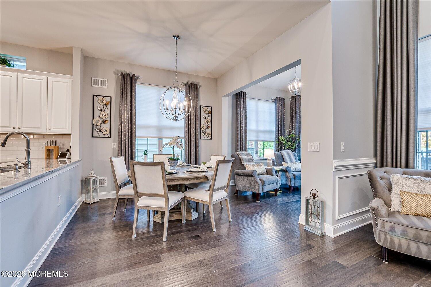 9 Militia Hill Road Freehold, NJ 07728 - Photo 15 of 67 a view of a dining room with furniture window and wooden floor