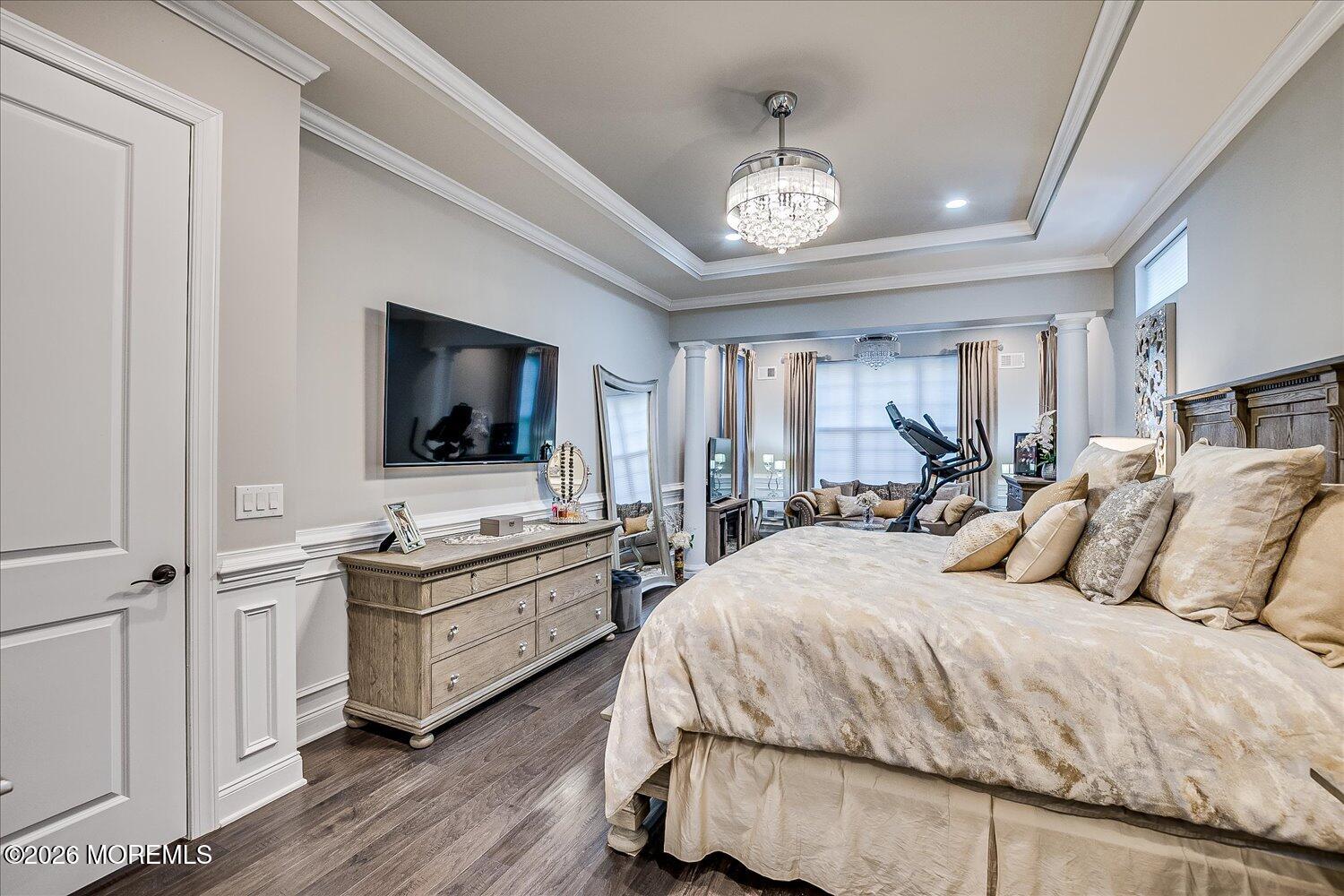 9 Militia Hill Road Freehold, NJ 07728 - Photo 28 of 67 a spacious bedroom with a bed and a flat screen tv