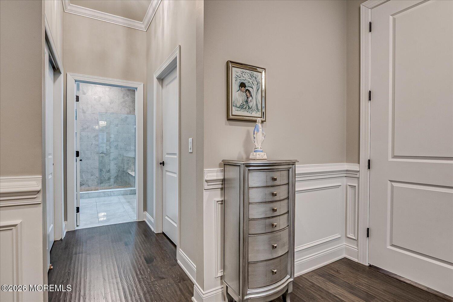 9 Militia Hill Road Freehold, NJ 07728 - Photo 32 of 67 a view of walk in closet with wooden floor