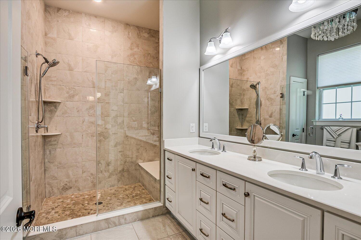 9 Militia Hill Road Freehold, NJ 07728 - Photo 33 of 67 a bathroom with a double vanity sink mirror and shower