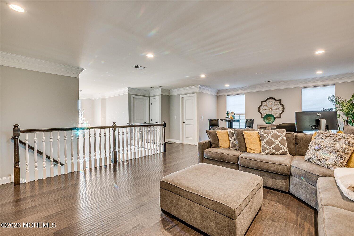 9 Militia Hill Road Freehold, NJ 07728 - Photo 37 of 67 a living room with furniture or wooden floor and a view of kitchen