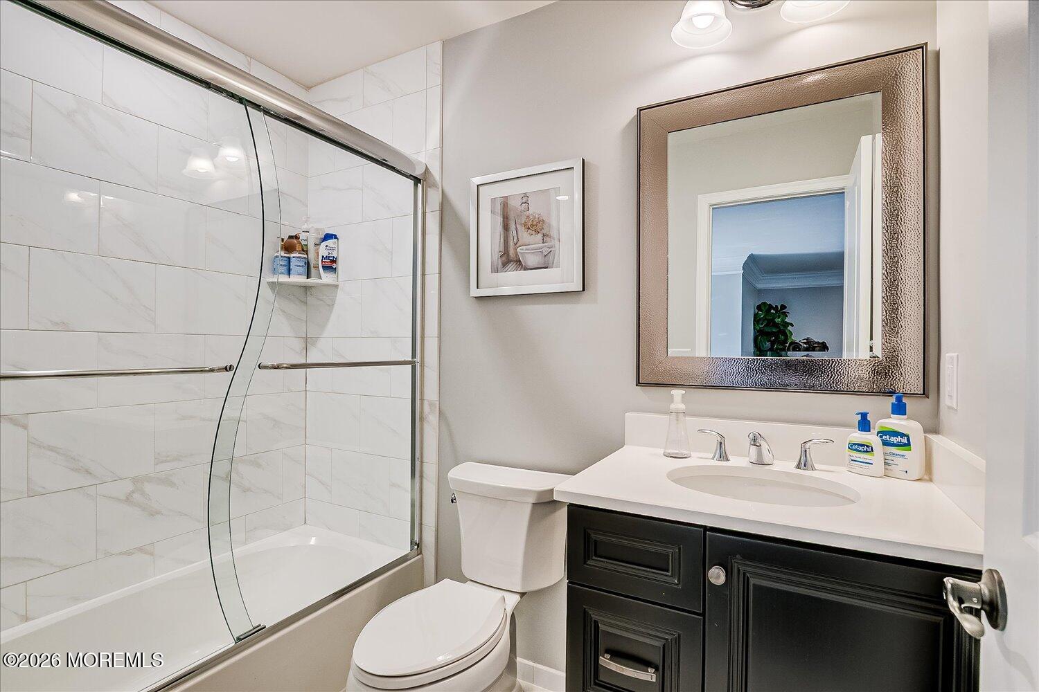 9 Militia Hill Road Freehold, NJ 07728 - Photo 43 of 67 a bathroom with a sink toilet and shower