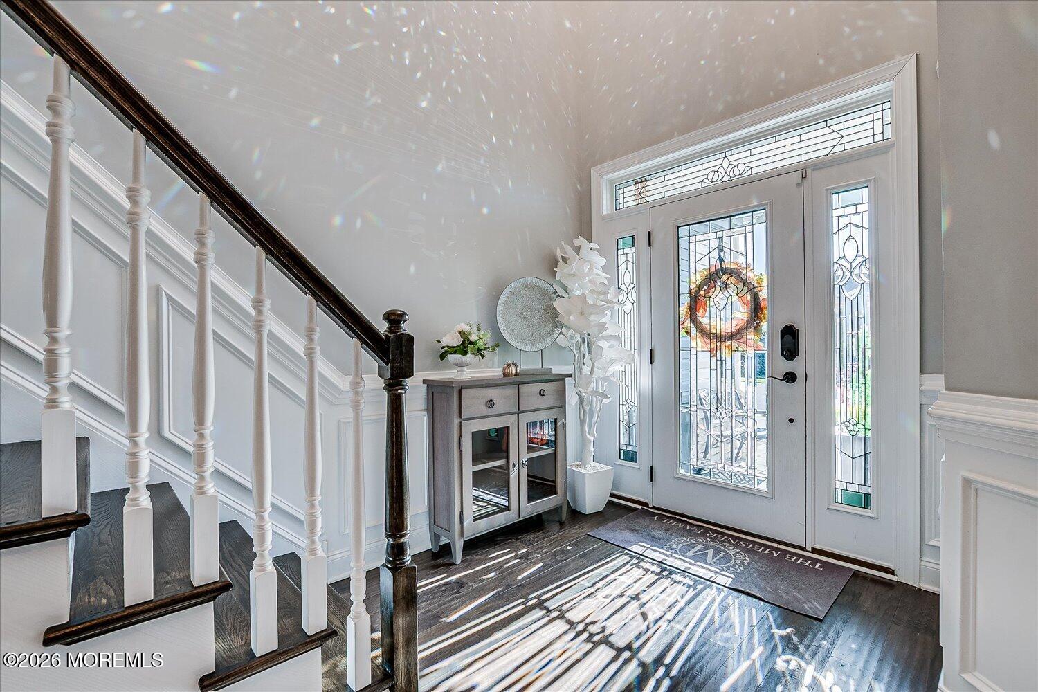 9 Militia Hill Road Freehold, NJ 07728 - Photo 5 of 67 a view of an entryway with wooden floor and a front door