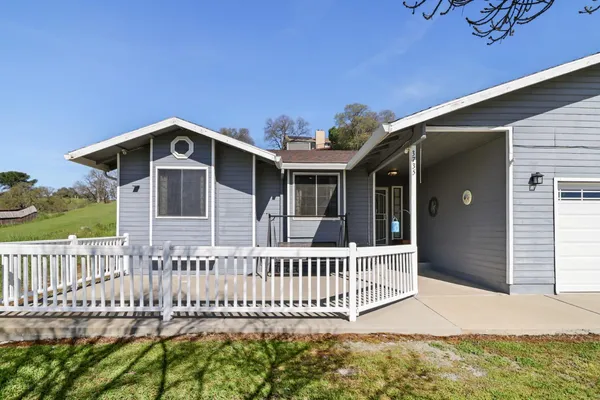 a front view of a house with a porch