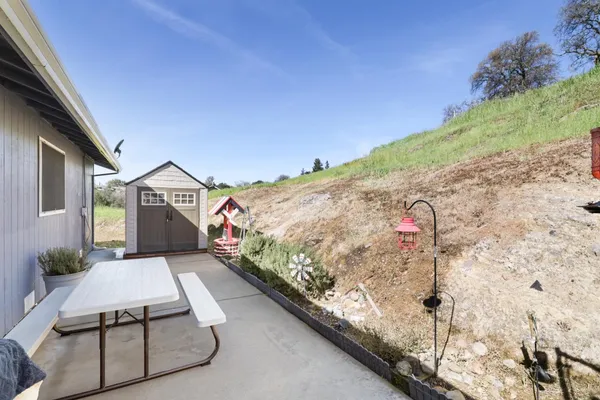 a balcony view with a fireplace