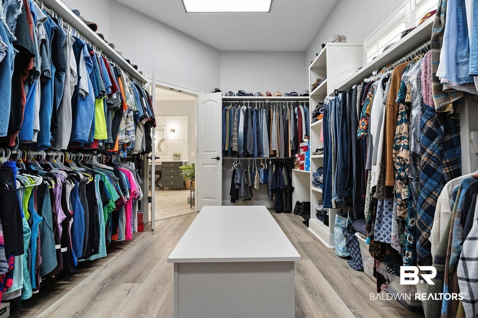 23357 Carnoustie Drive Foley, AL 36535 - Photo 64 of 99 Walk in closet featuring light wood-type flooring