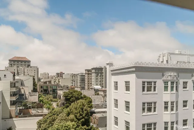 a bathroom with a bathtub shower sink vanity and a toilet