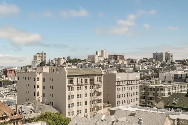 a view of a city with tall buildings