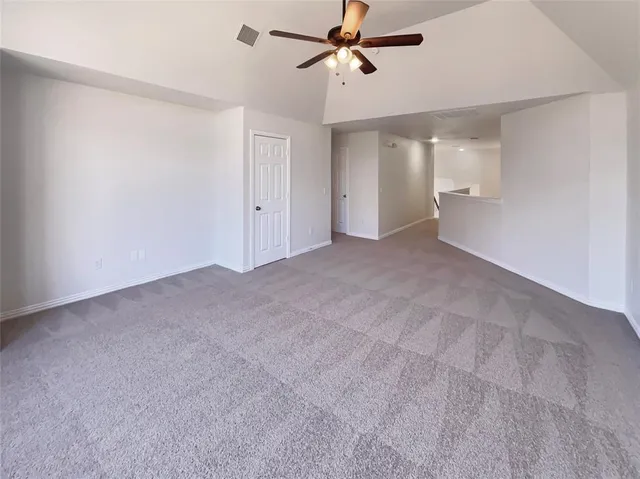 a bathroom with a sink shower and a mirror