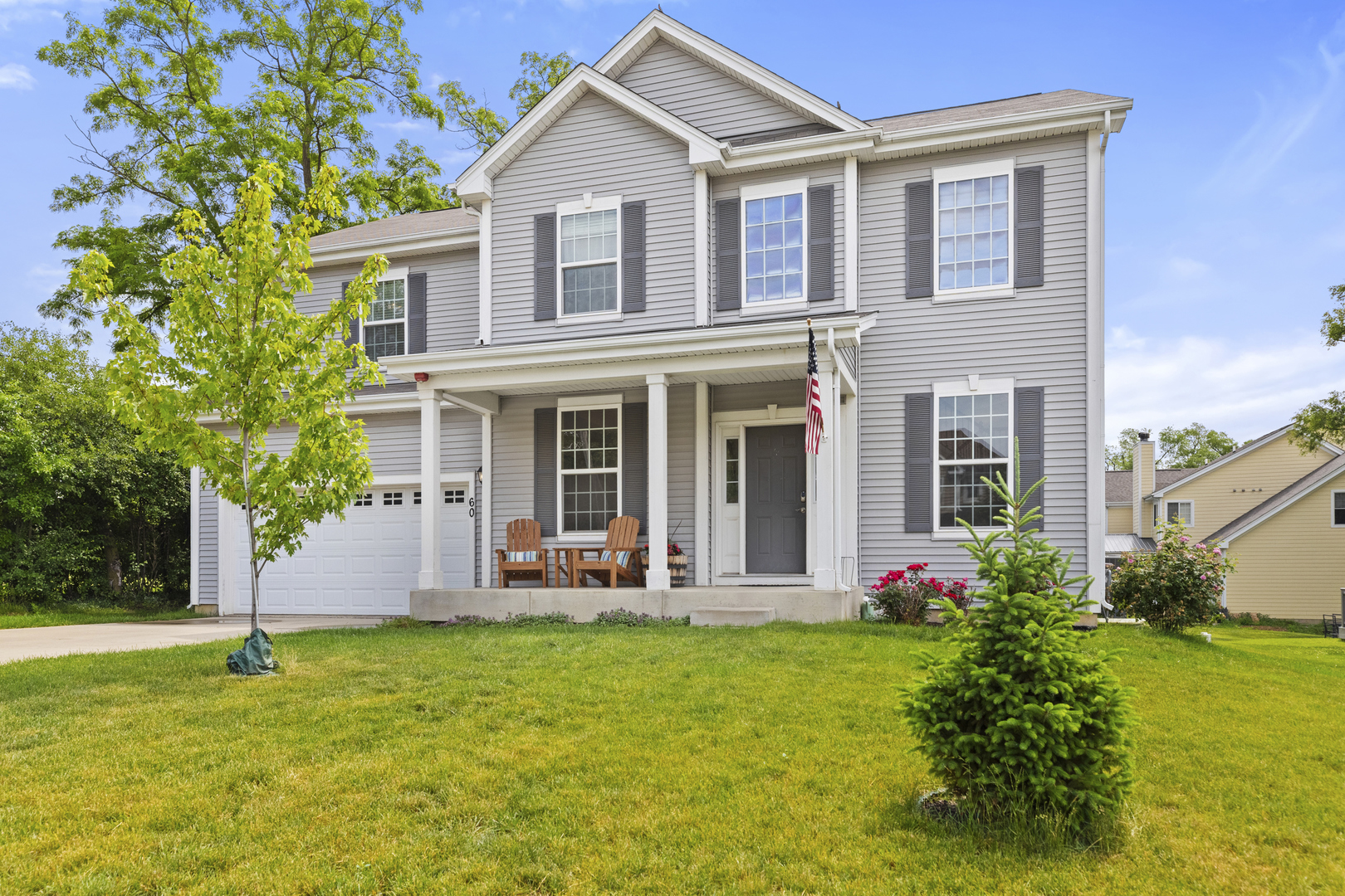 60 Linden Road Lake Zurich, IL 60047 - Photo 1 of 18 a front view of house with garden