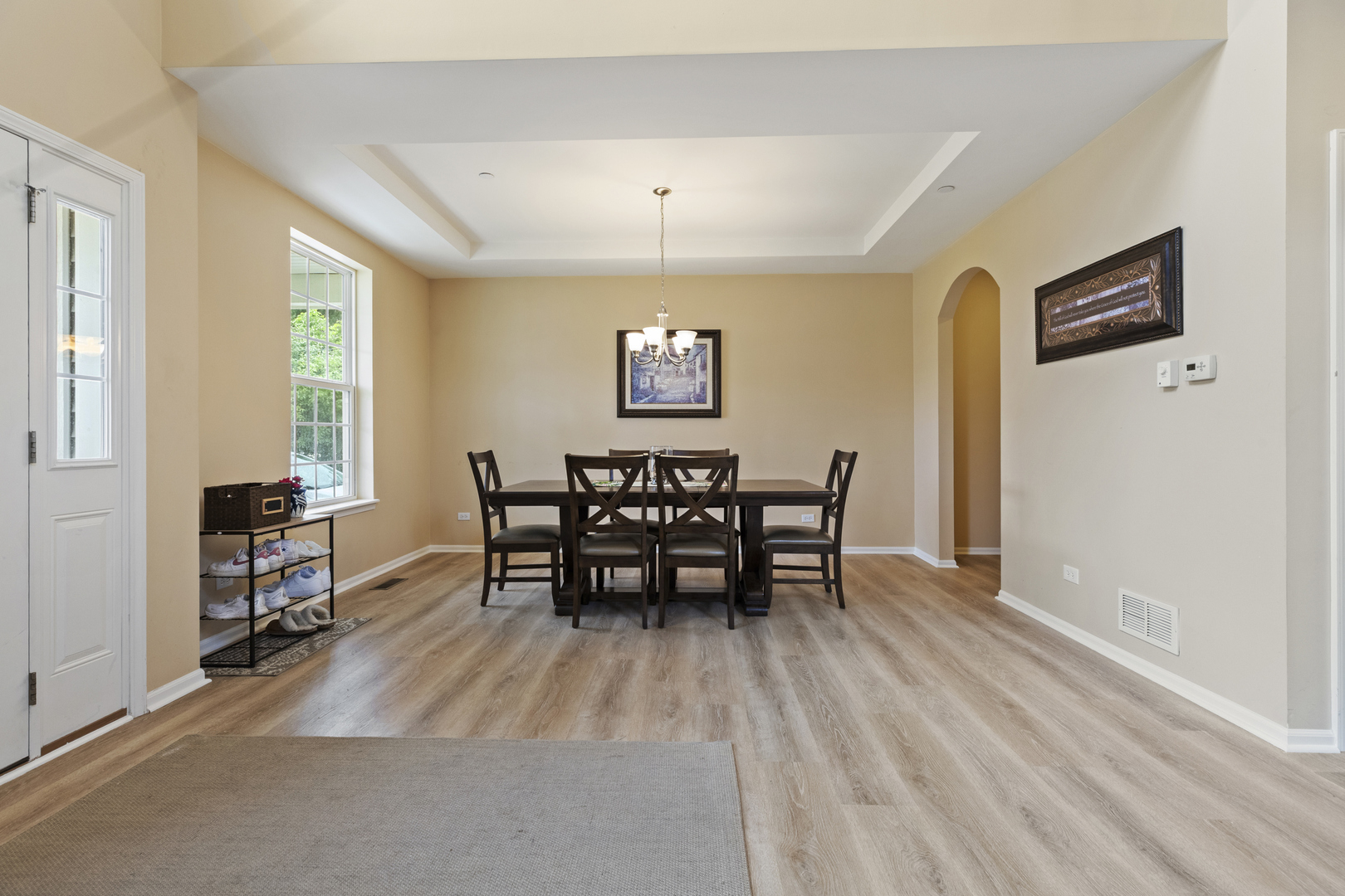 60 Linden Road Lake Zurich, IL 60047 - Photo 4 of 18 a view of a dining room with furniture and a window