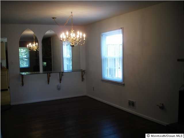 11 Peach Tree Road Oakhurst, NJ 07755 - Photo 3 of 3 a view of a livingroom with a window