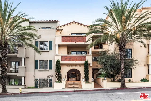 a front view of a house with a outdoor space