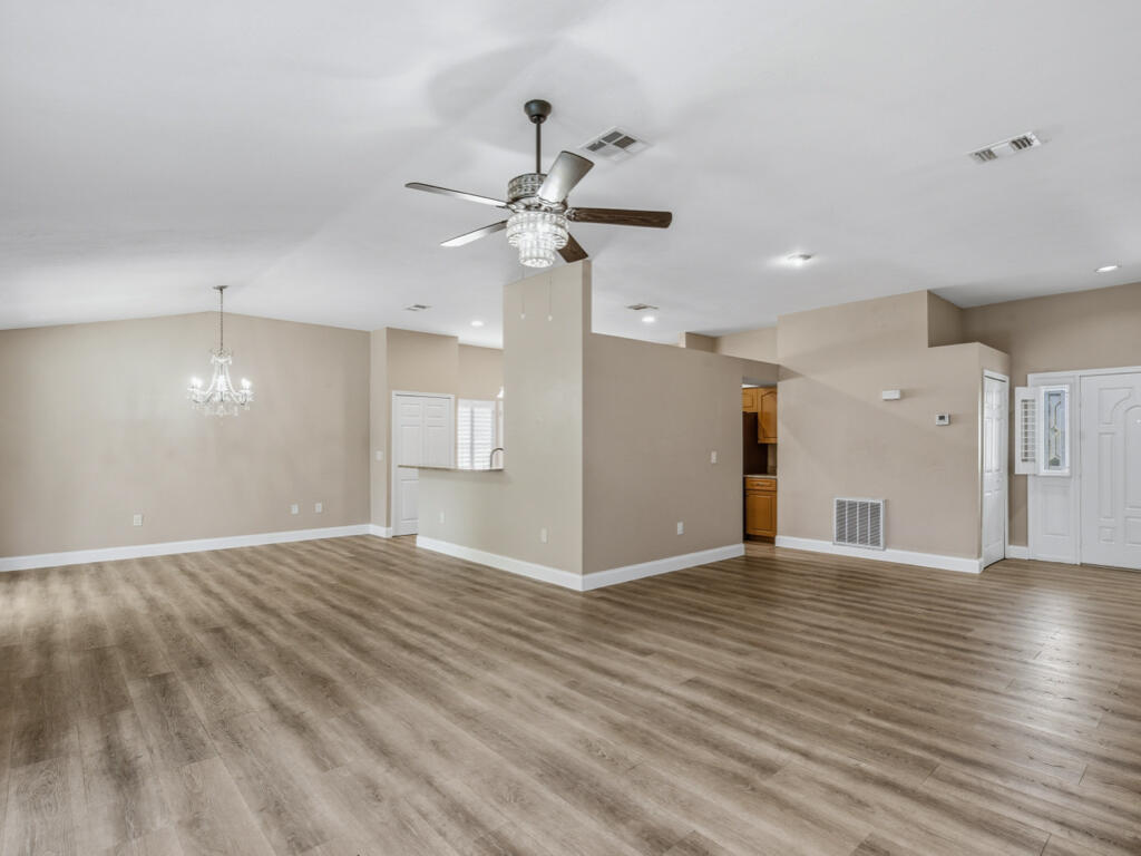 3650 Kent Drive Naples, FL 34112 - Photo 12 of 17 a view of an empty room with a window