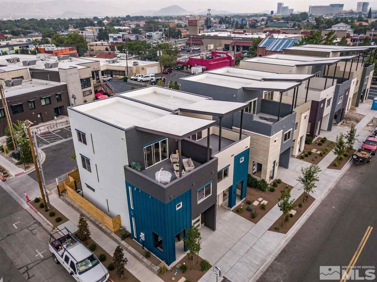 1412 Tonopah Street Reno, NV 89509 - Photo 17 of 17 a view of a roof deck with table and chairs a barbeque and stove