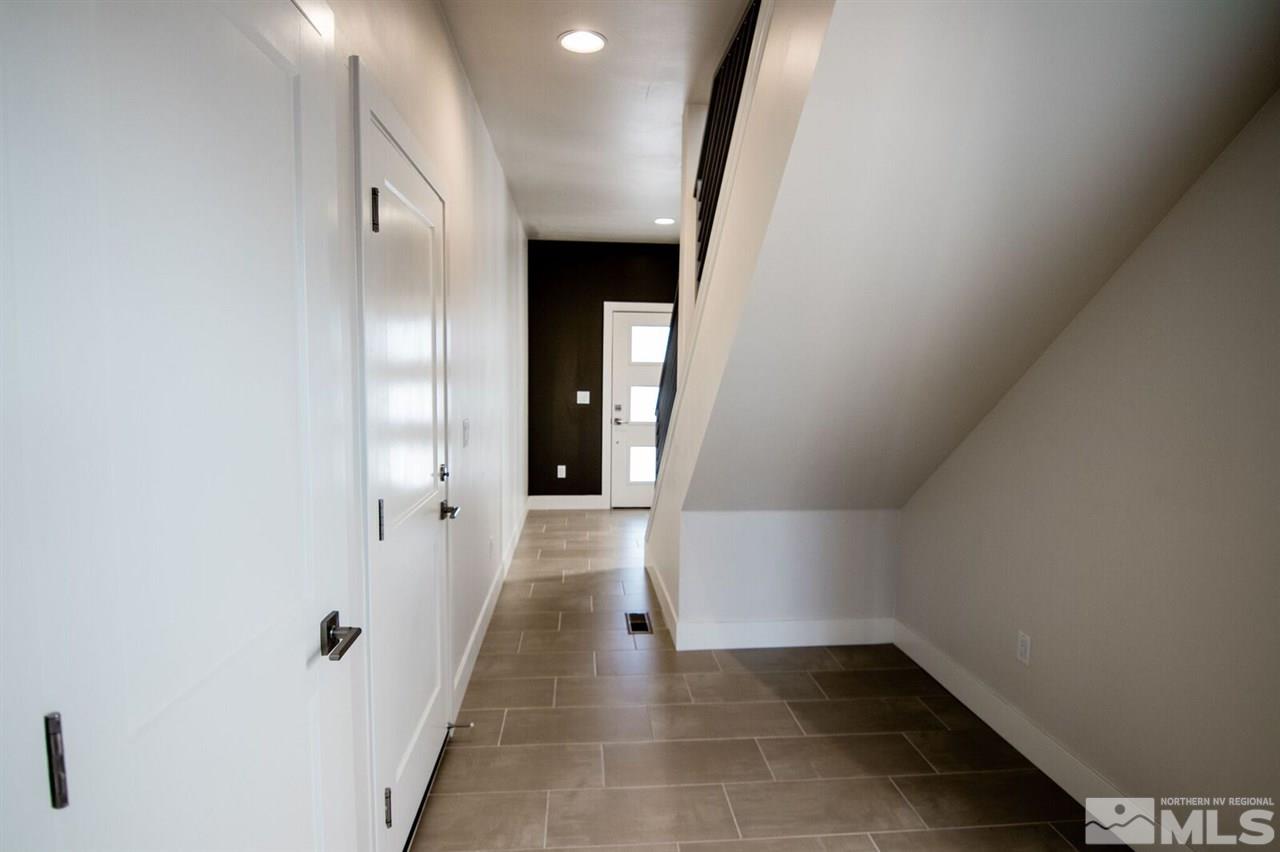 1412 Tonopah Street Reno, NV 89509 - Photo 8 of 17 a view of a hallway with wooden floor