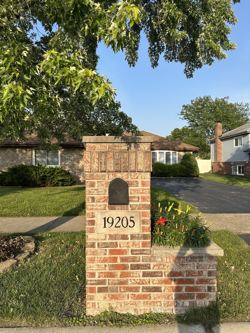 a view of building with yard