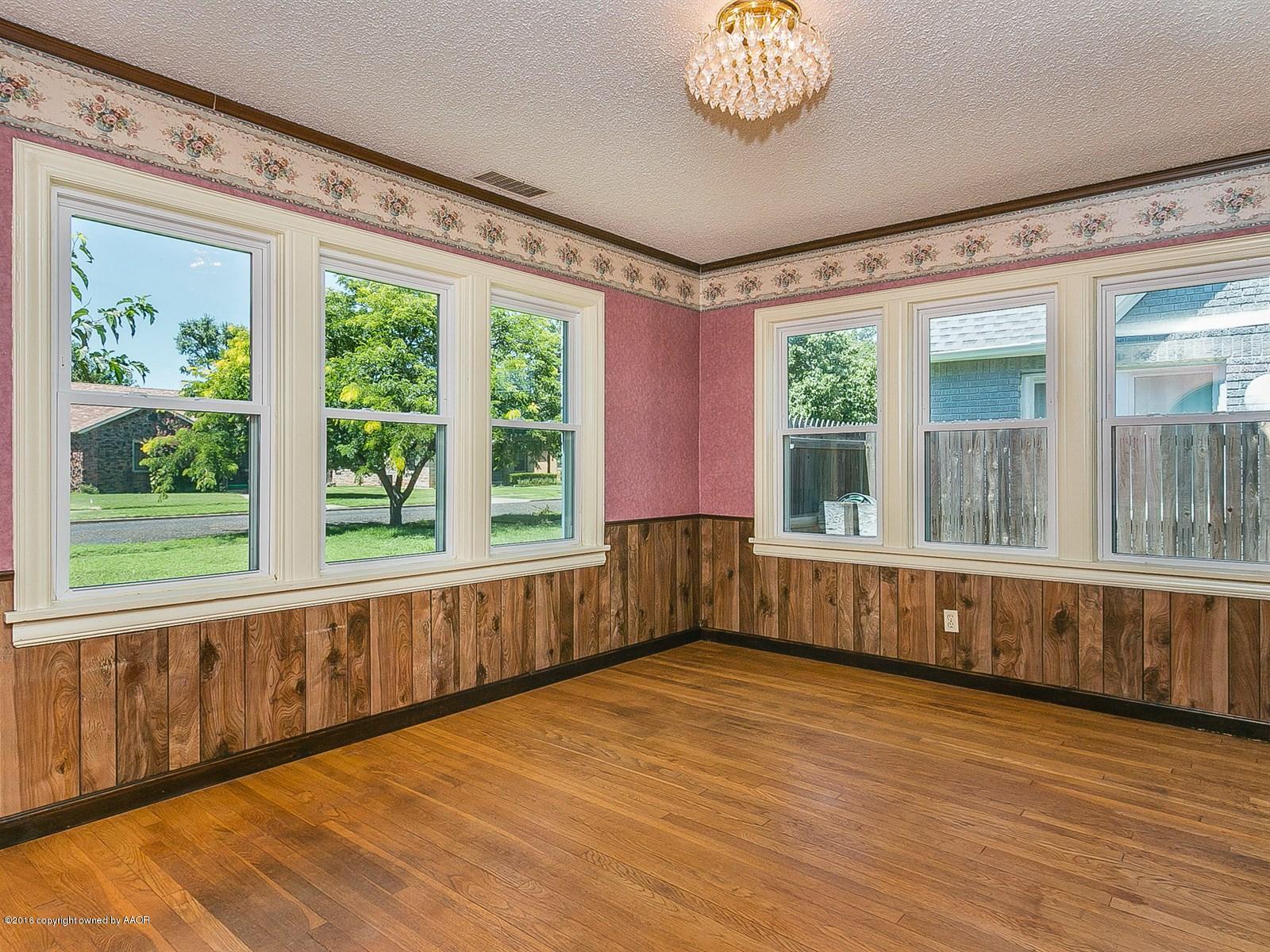 1227 South Bonham Street Amarillo, TX 79102 - Photo 7 of 25 a view of an empty room with a window