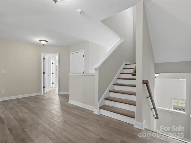 a view of entryway with wooden floor
