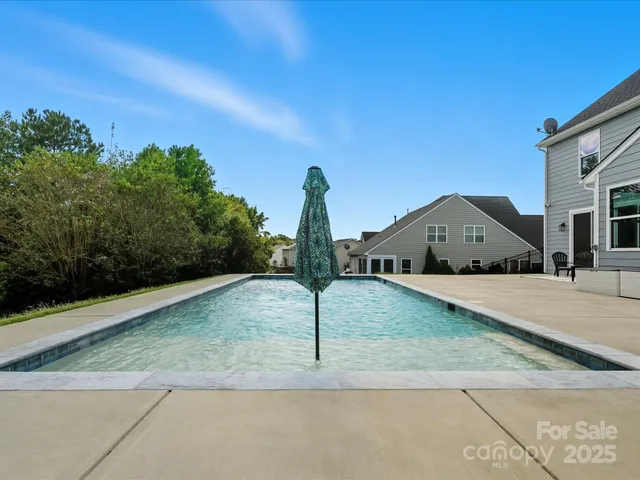 a house with garden in front of it