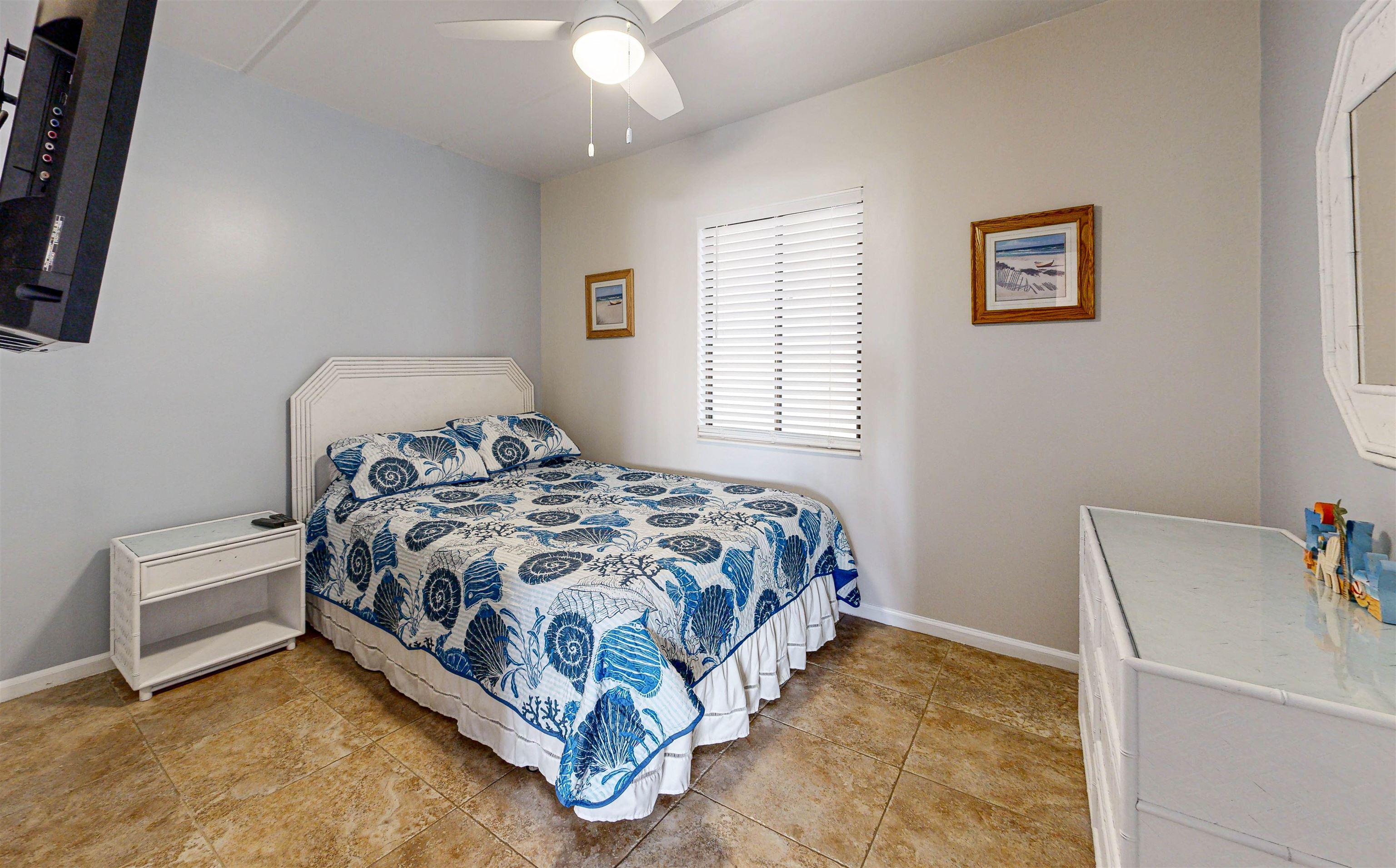 880 A1A Beach Boulevard, Unit 6101 St. Augustine, FL 32080 - Photo 11 of 21 a bedroom with a bed and a window