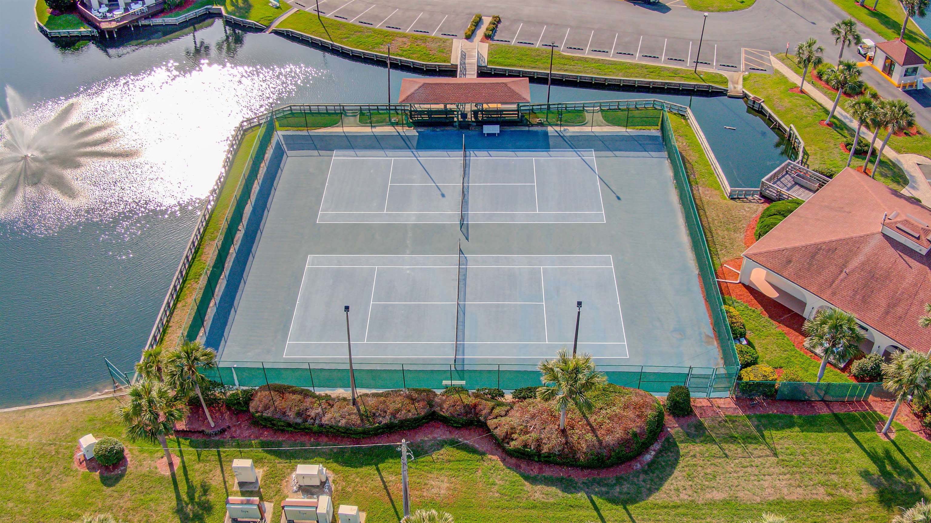 880 A1A Beach Boulevard, Unit 6101 St. Augustine, FL 32080 - Photo 16 of 21 a backyard of a house with outdoor seating and outdoor kitchen view