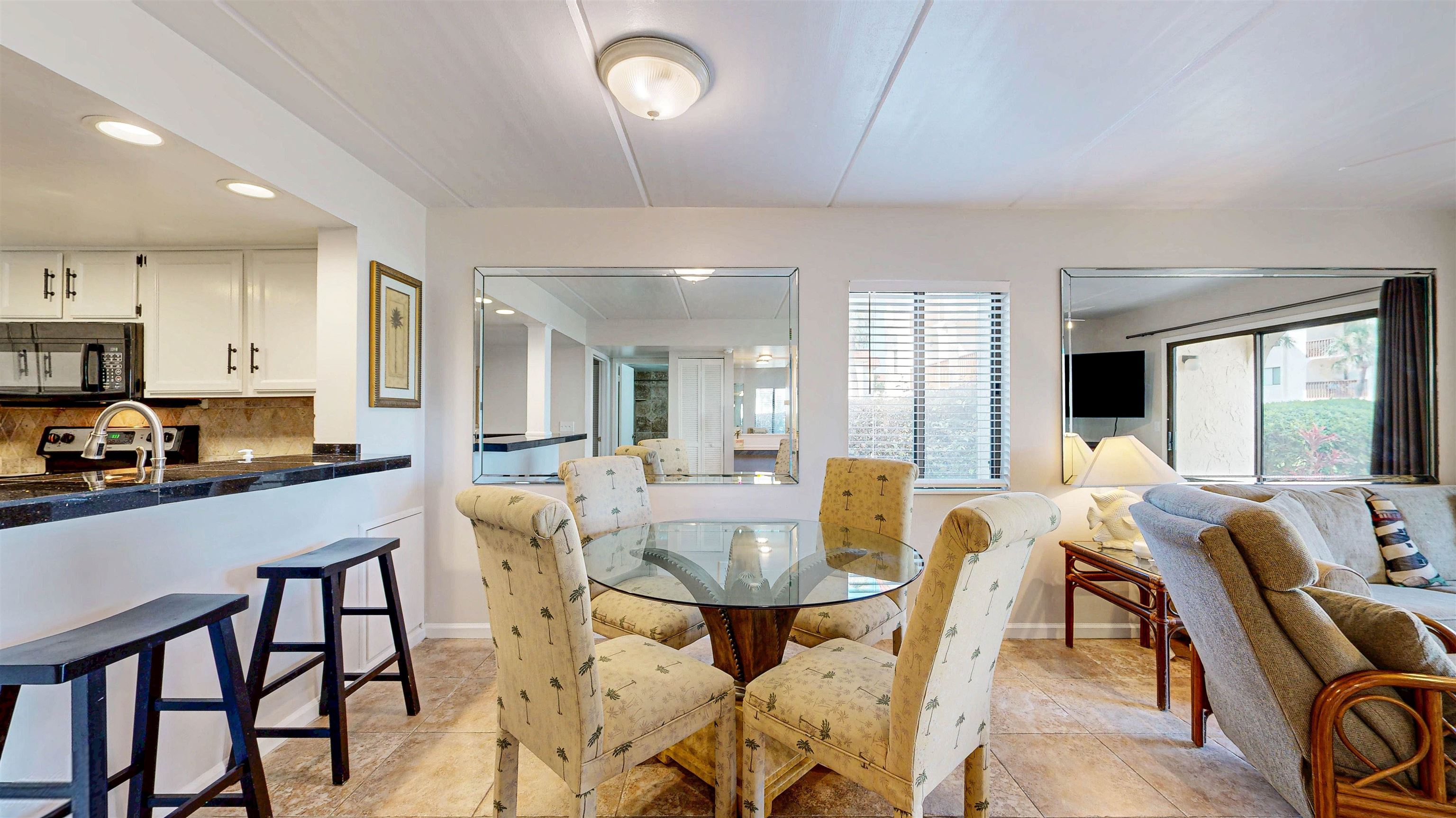 880 A1A Beach Boulevard, Unit 6101 St. Augustine, FL 32080 - Photo 4 of 21 a view of a dining room with furniture window and outside view