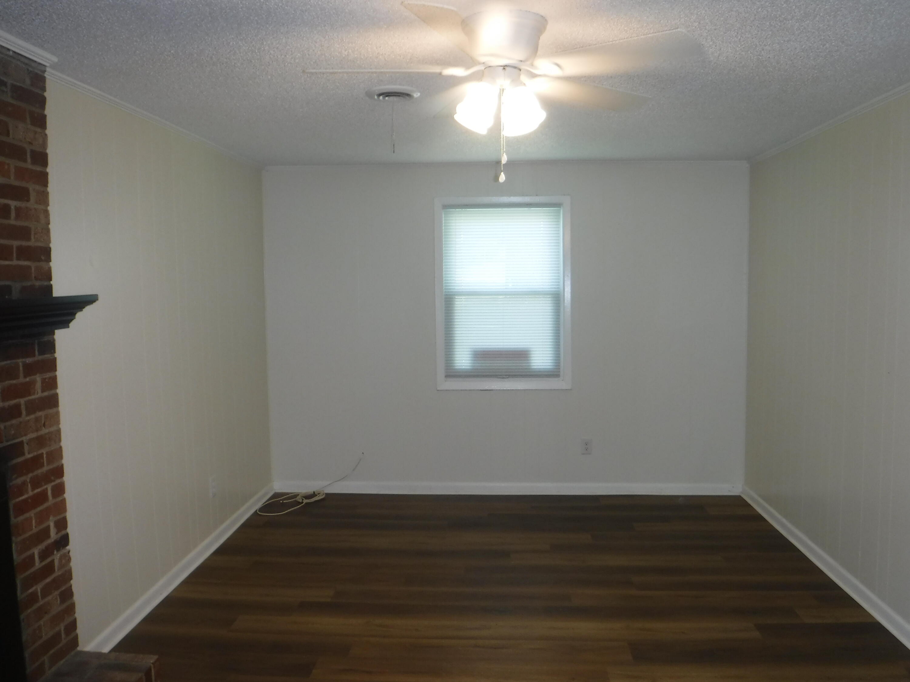 402 Parliament Road Martinez, GA 30907 - Photo 8 of 37 12x22 den with one window and ceilng fan